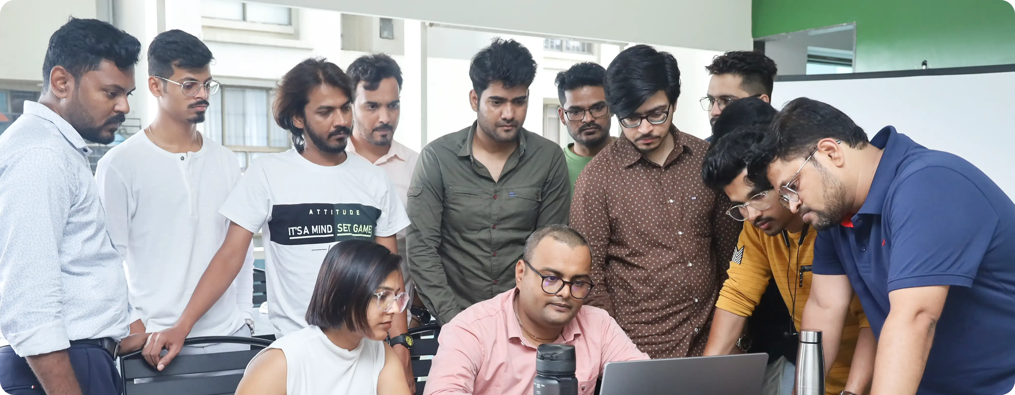 Designers at Koru Team of UX designers collaborating in a creative workspace